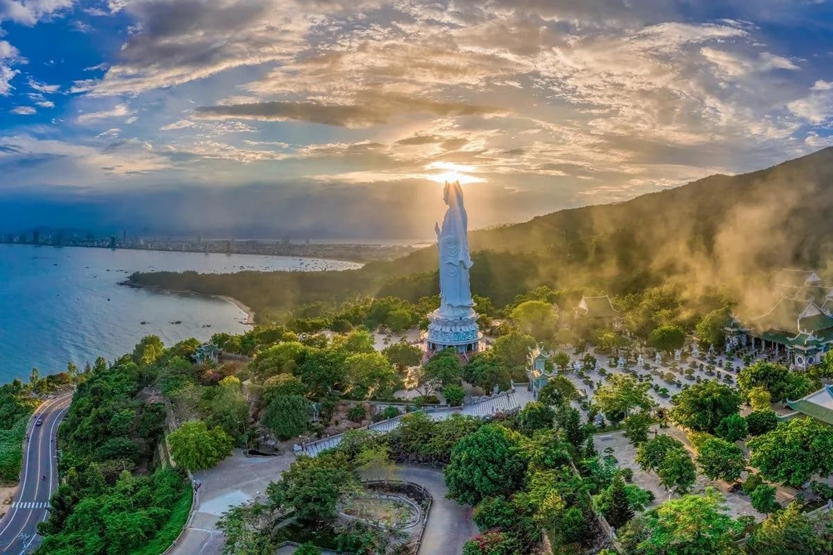 Lady Buddha at sunrise with mist