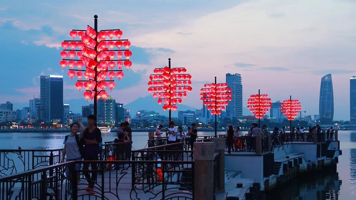 Lanterns along the Hoi An riverside at dusk