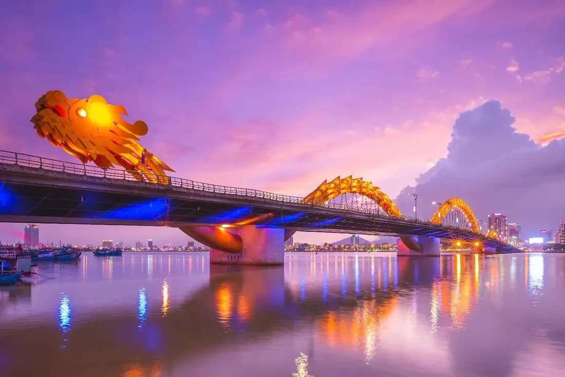 Dragon Bridge breathing fire over the Han River at dusk