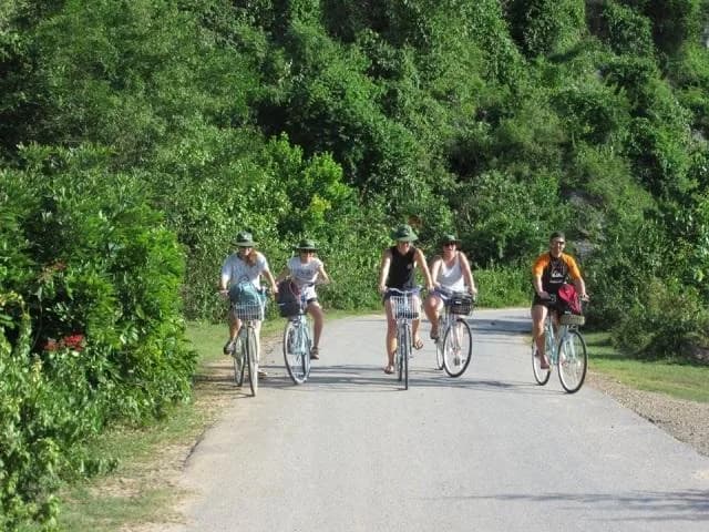 Group cycling along My Khe Beach