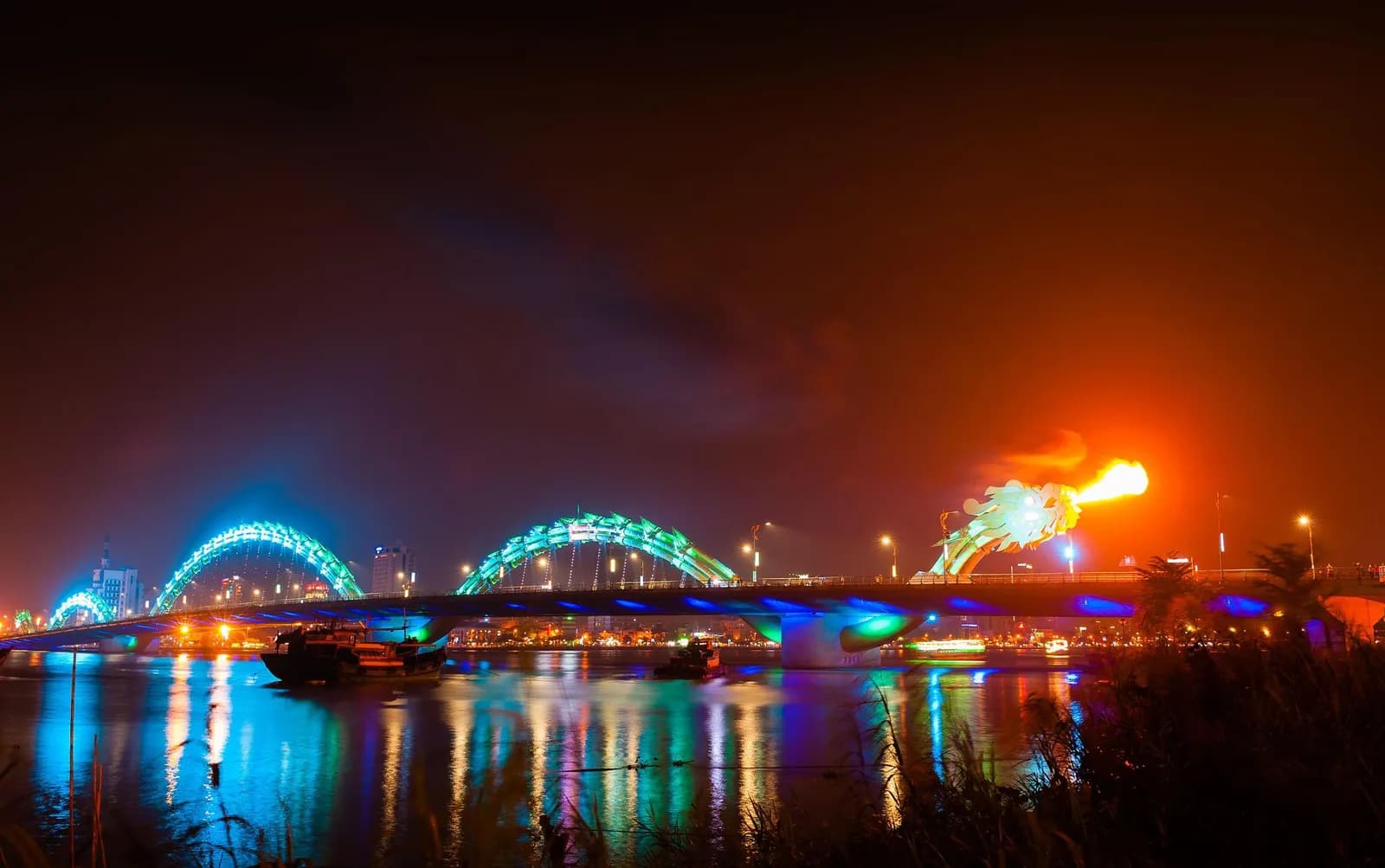 Dragon Bridge breathing fire over Han River at night